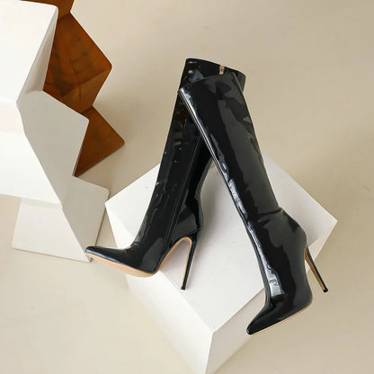 Sexy boots, Stiletto heels, Knee-high style, Party footwear, Nightlife fashion, Statement boots, Sophisticated design, Glamorous attire, Fashion forward, Show-stopping look,