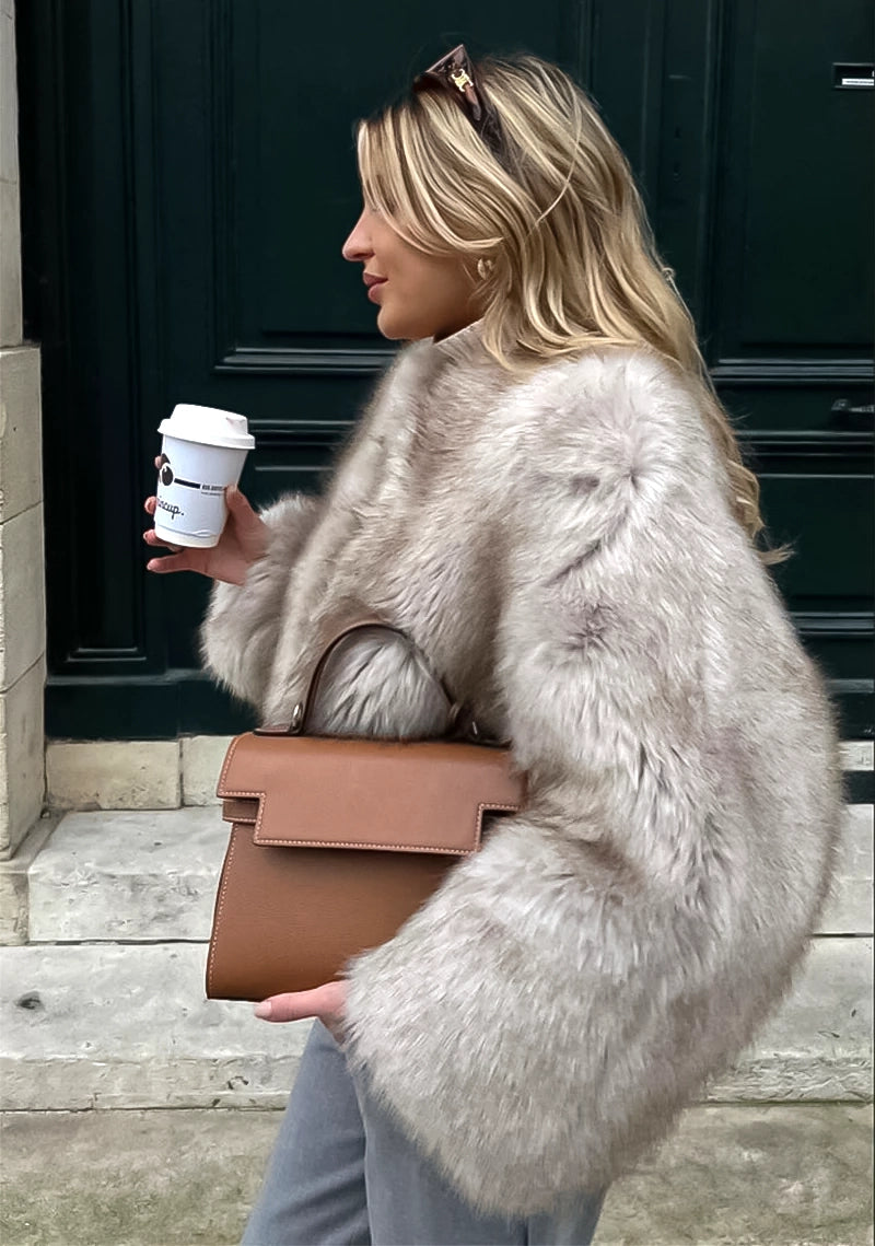 Faux fur jacket, V collar jacket, Iconic fashion, Street style, Trendy outerwear, Fashion statement, Urban chic, Faux fur trend, Contemporary fashion, Streetwear glamour,