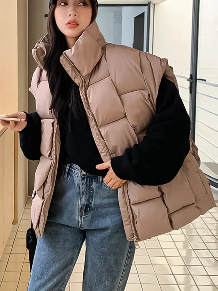 Puffer vest, Sleeveless outerwear, Quilted design, Lightweight warmth, Layering essential, Versatile fashion piece, Urban style, Active lifestyle, Casual chic, Sporty fashion statement,