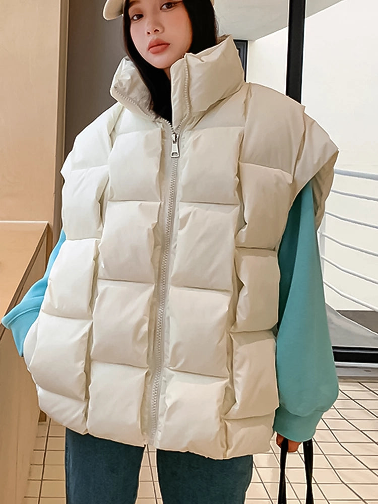 Puffer vest, Sleeveless outerwear, Quilted design, Lightweight warmth, Layering essential, Versatile fashion piece, Urban style, Active lifestyle, Casual chic, Sporty fashion statement,