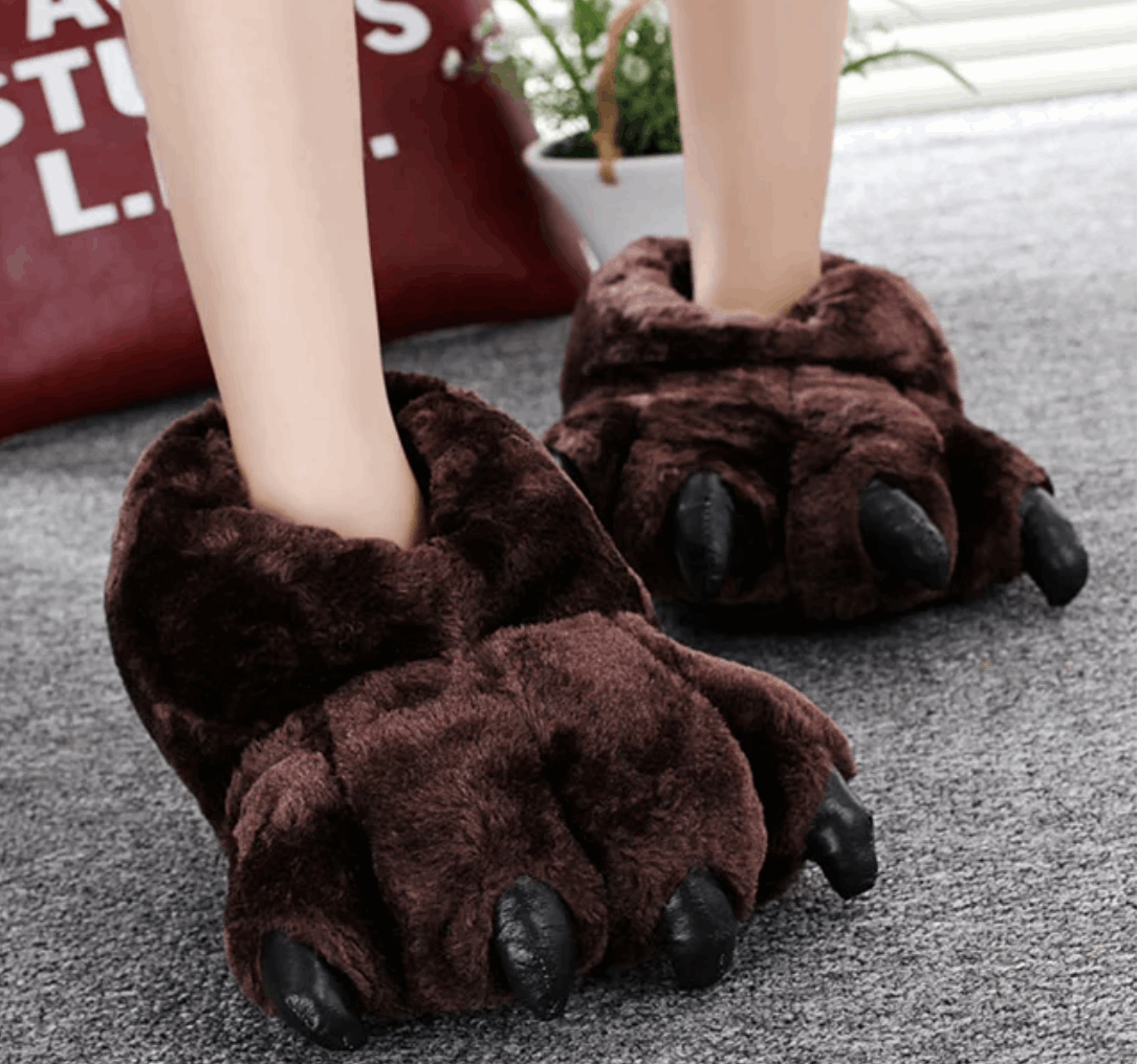 Bigfoot slippers Bear paw slippers Chunky slippers Unisex footwear Cozy comfort Novelty slippers Winter essentials Quirky fashion Furry footwear Unique gift idea