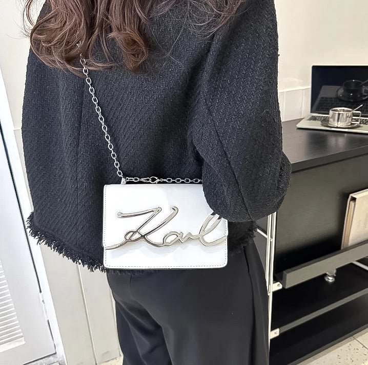 Karl Lagerfeld, casual, handbag, Fashion, accessory, trendy, Everyday, style, chic, Designer, purse, versatile, Urban, contemporary, must-have, Streetwear, accessory, functional, Lightweight, spacious, on-the-go, Minimalist, sleek, accessory, High-quality, craftsmanship, modern, Statement piece, accessory, casual.